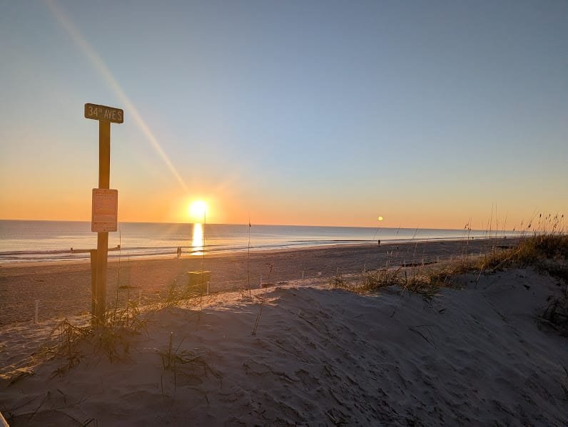 Sunrise over the ocean at the 34th Ave S beach access